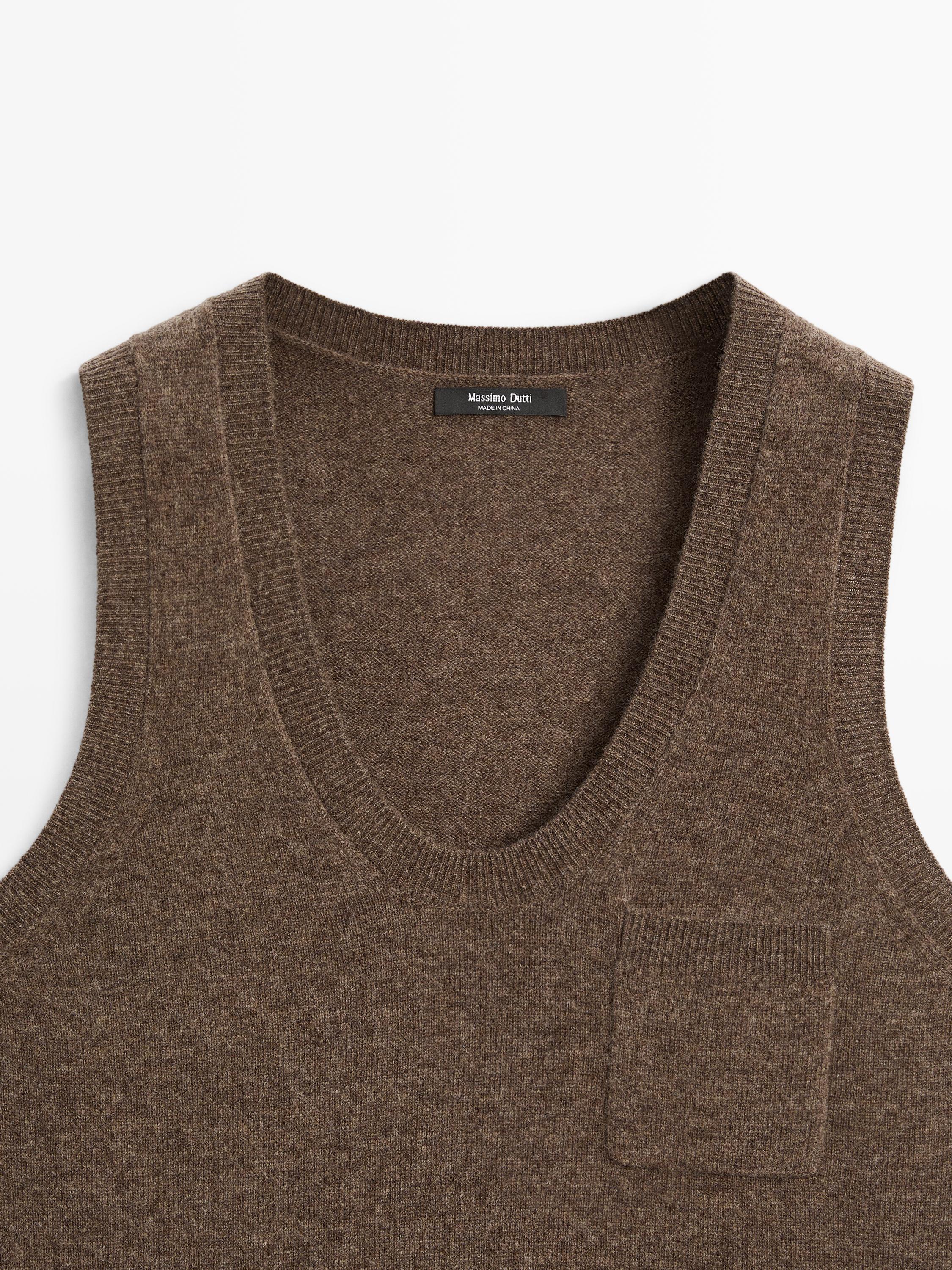 Wool blend top with pocket detail